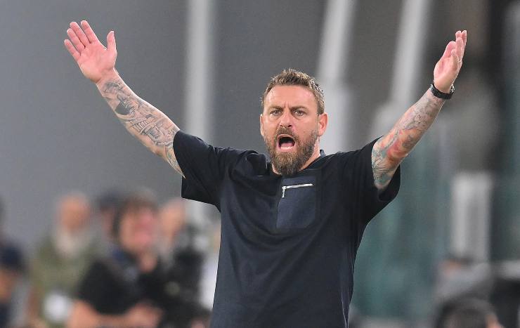 Daniele De Rossi con le braccia alzate