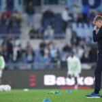 Marco Baroni con le mani sul volto